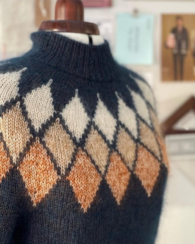 Pull à jacquard losange géométrique