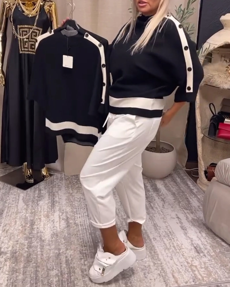 Pull boutonné color block